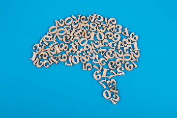 Human brain symbol made of numbers on a blue background. Mind concept, thought process, analysis