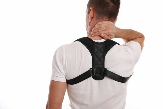Man with posture corrector. Scoliosis, Kyphosis treatment