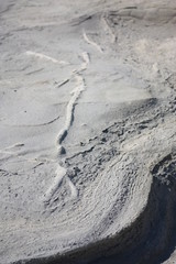 Texture of white rock surface eroded by the sea