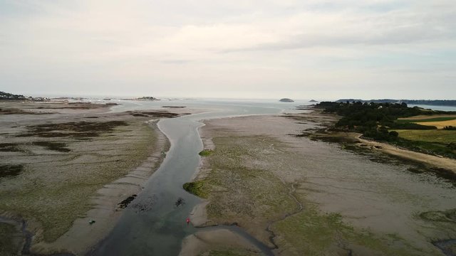 Aerial view. Channel fairway navigation marks during low tide in the town of Paimpol in Northern France, in Brittany.