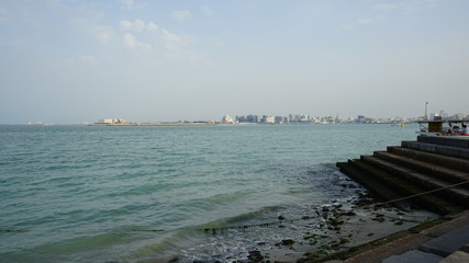 sea, water, beach, sky, ocean, coast, boat, blue, travel, sand, landscape, ship, summer, nature, harbor, tourism, city, sunset, pier, waves, clouds, bay, horizon, Doha