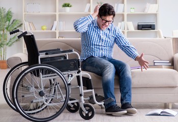Young student on wheelchair in disability concept