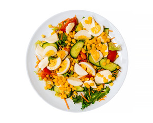 vegetables  and eggs on plate isolated on white