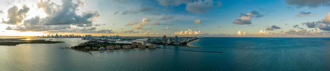 Aerial drone panorama Miami Beach inlet sunset twilight shot