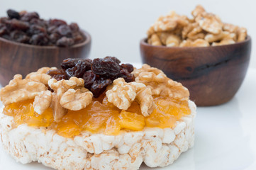  Rice biscuit with papaya candy, nuts and raisins.