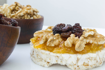  Rice biscuit with papaya candy, nuts and raisins.