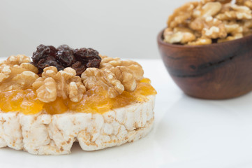  Rice biscuit with papaya candy, nuts and raisins.