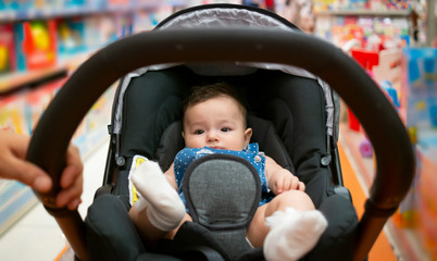to shop in baby stores with stroller. baby in stroller