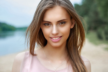 Fototapeta premium Magnificent girl outdoor portrait - close up