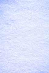 Snow surface background close up at sunny winter day