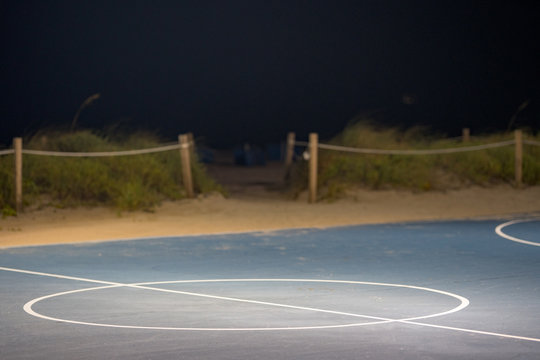 Night basketball half court circle painted lines