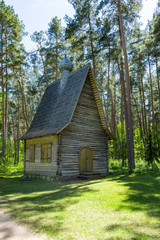 Fototapeta na wymiar Vintage countryside log house with the yard on a sunny summer day.