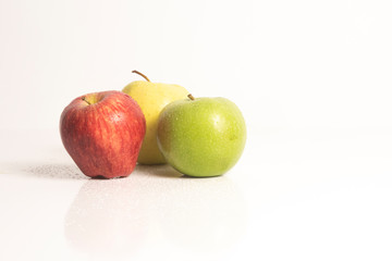 three apples isolated on white background