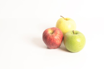 apples on white background green,red,yellow