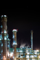 Oil refinery and carbon factory in the foggy night long exposure.