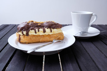 breakfast with coffee and eclair 