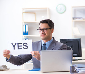 Businessman in positive yes answer in the office