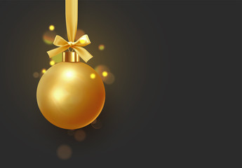 Christmas golden balls hang on ribbon with bow. Xmas bauble with realistic light blur bokeh effect.