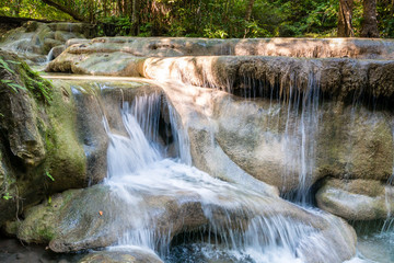 Fototapeta na wymiar Erawan jumping waterfall in Kanchanaburi