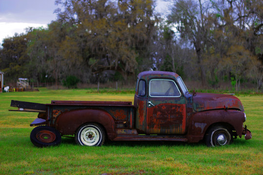 Old 1950s rusted truck red abandoned 