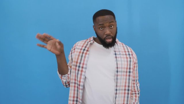 sarcastic afro american guy joker showing exaggerated gesture no 4K