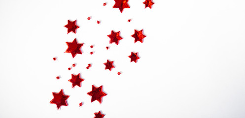 christmas background of red stars on a white background