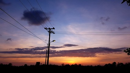 silhouette of windmill at sunset