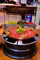 table with salami and fruits food