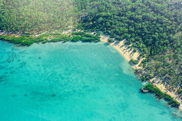 overhead tropical beach coastline