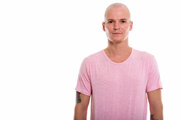 Fototapeta premium Studio shot of young handsome bald man