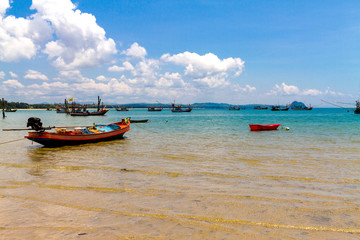 Fototapeta premium Beach fishing boat and cloud sky at Bang Boet beach
