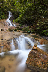 Fototapeta na wymiar waterfalls found in tropical rainforest in Malaysia