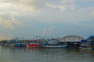 Fototapeta premium fishing boat At the coast There are many fishing boats at the pier. During the sunset