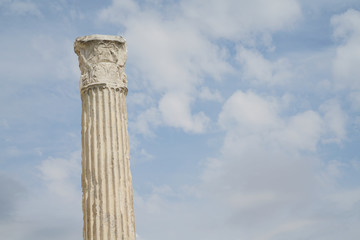 Single Greek Doric pillar against sky