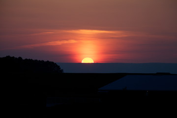 Orange sunrise over horizon