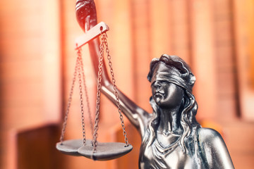 Law theme,Lady Justice Statue on wooden background,law concept