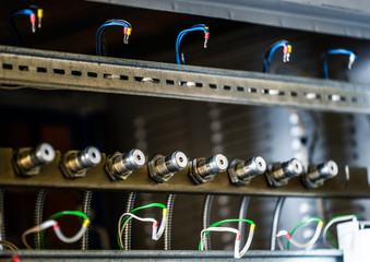 Rows of metal round plugs connected to each other