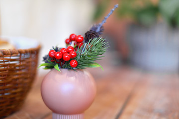 Christmas decoration. In the jar is a branch of the Rowan and pine cones. Christmas.