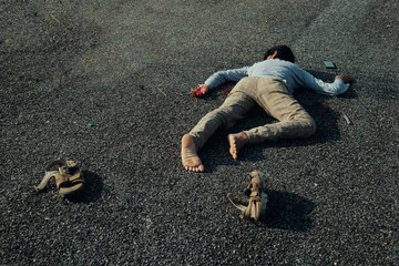 Concept of Crime scene , victim dead body laying on Road