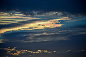 Fototapeta premium Shades of sky blue with sun bouncing off clouds