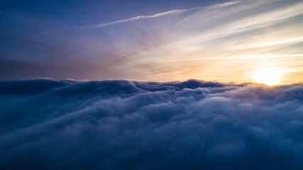 Aerial sunny view Mystical gray winter clouds