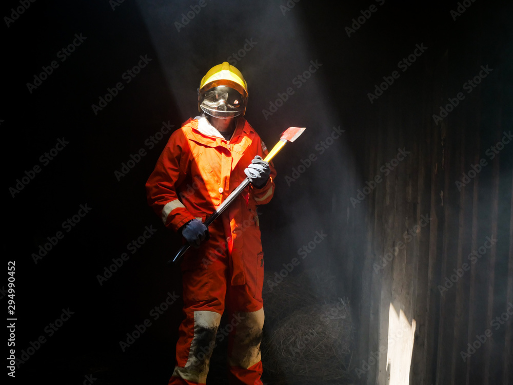 Poster firefighter spray water to fire burning car workshop fire training