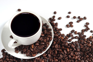 coffee cup with coffee beans isolated on white background