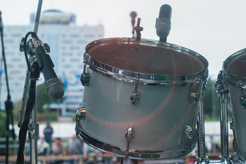 Fototapeta na wymiar Drum kit close-up, microphones to amplify the drums,