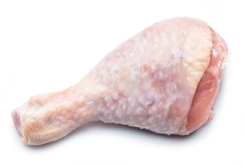 Raw chicken leg isolated on white background.