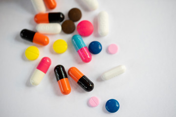 drug with colorful pills and blue background,drug,Prescription 