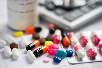 drug with colorful pills and blue background,drug,Prescription 