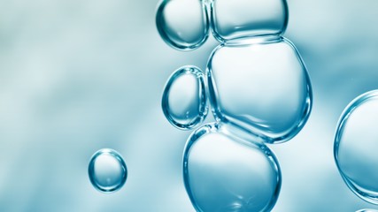 transparent gas bubbles on water surface. Worms-eye low angle with crystal bubbles in purified...