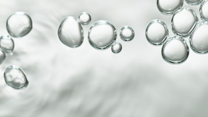transparent gas bubbles on water surface. Worms-eye low angle with crystal bubbles in purified...