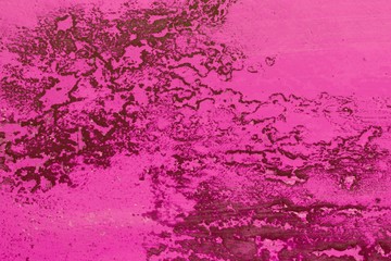 pink large cracks on brushed stucco texture - fantastic abstract photo background